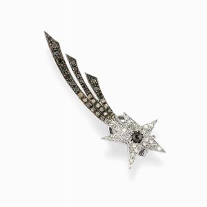 A 9k white, burnished gold and diamond single earclip, Bernard Delettrez