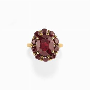A 18K gold and garnet ring