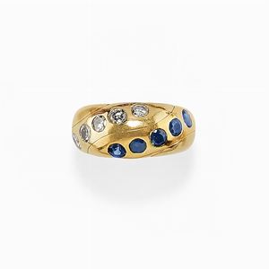 A 18K gold, sapphire and diamond ring