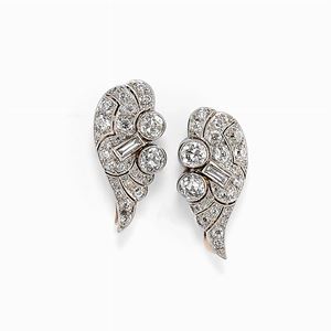 A 18K two-color gold and diamond earrings, circa 1930