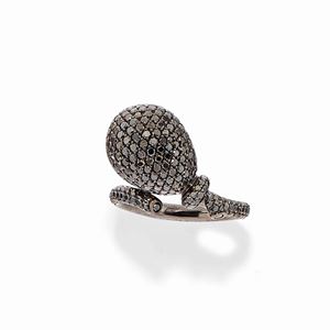 A 18k white gold and black diamond ring, Vhernier, with box and warranty