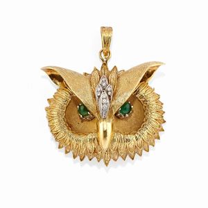 A 18k two-color gold, diamond and emerald pendant-brooch