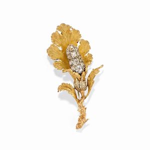  - Spilla in oro bicolore 18k e diamanti