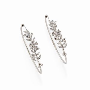 A 18k white gold and diamond earrings