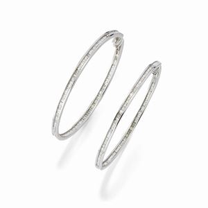  - A 18k white gold and zircon earrings