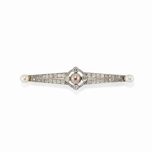  - A platinum, 18k white gold, diamond and pearl brooch