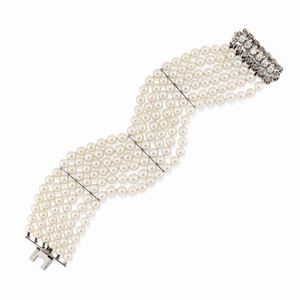  - A 18k white gold, diamond and cultured pearl bracelet
