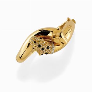 Bracciale in oro 18k, onice, smeraldi e diamanti