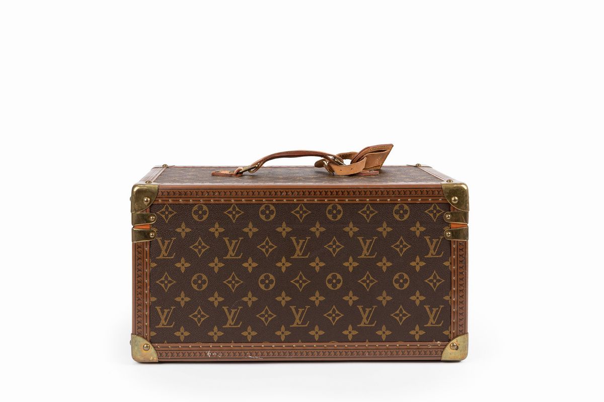 Louis Vuitton - Beauty case in tela monogram con profili in cuoio e dettagli in ottone