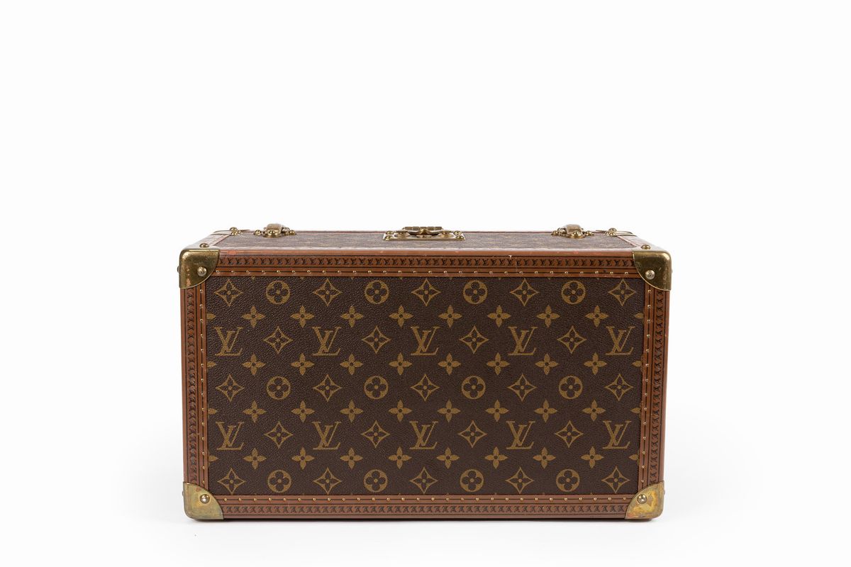 Louis Vuitton - Beauty case in tela monogram con profili in cuoio e dettagli in ottone