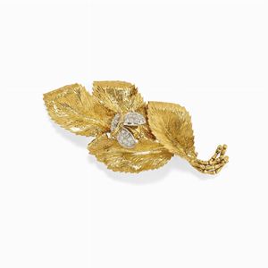 Spilla in oro bicolore 18k e diamanti