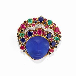 A 18k two-color gold, glass paste, diamond, ruby, emerald and sapphire pendant-brooch