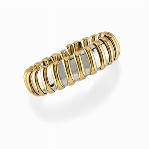A 18K yellow gold and metal bangle, Bulgari