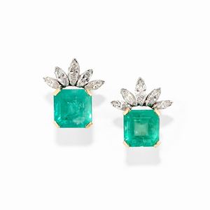 A 18k two color gold, emerald and diamond earrings, with certificate