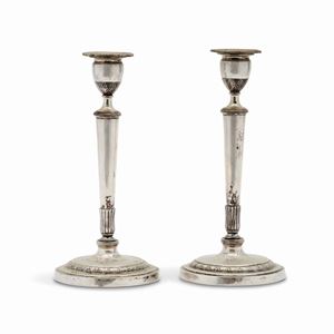Two silver candlesticks, 19th Century
