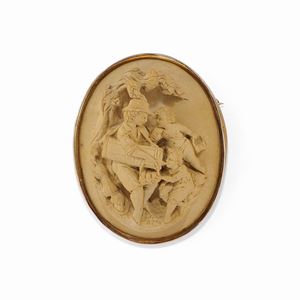 A gilded metal and lava stone cameo brooch, late 19th century