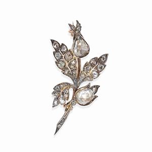 A 18k red gold, silver and diamond brooch