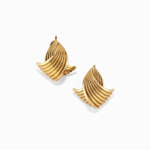 A 14K gold earclips, Cartier