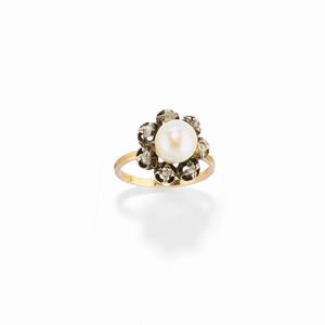 A 18k yellow gold, silver, cultured pearl and diamond ring