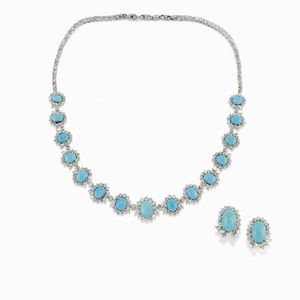  - Demi parure in oro bianco 18k, turchesi e diamanti