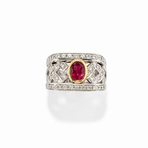 A 18k two-color gold, ruby and diamond ring
