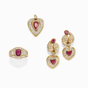  - Demi parure in oro bicolore 18k, diamanti e rubini