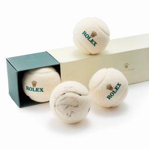 Wimbledon Championships tennis balls, autographed by Roger Federer, 2009