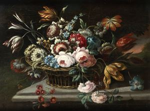 Fiori in un cesto di vimini su un tavolo di pietra