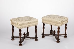A pair of walnut stools, 17th c.