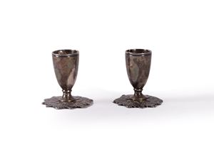 Coppia di porta candele in argento, secolo XIX