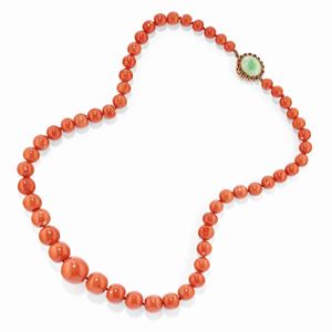 A 18k yellow gold, jadeite, ruby and coral necklace, defect