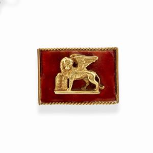 A 18k yellow gold and enamel brooch