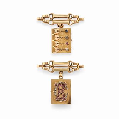 Spilla in oro giallo 18k con rubini, diamanti e zaffiro