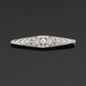 A 18K white gold and diamond brooch