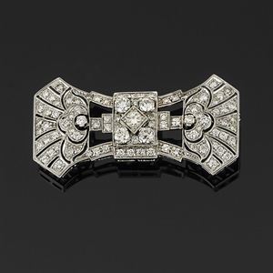 A 18K white gold and diamond brooch