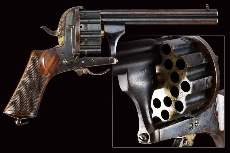 A rare twentyshot overandunder barreled pinfire revolver Rare and