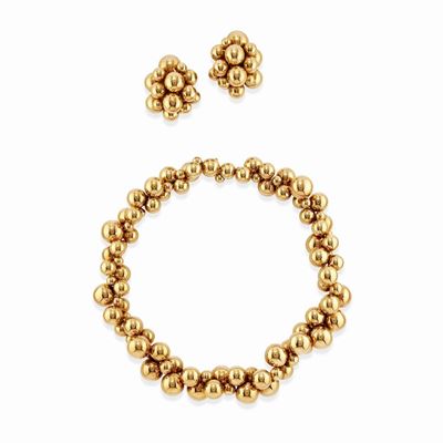 Demi parure in oro giallo 18k