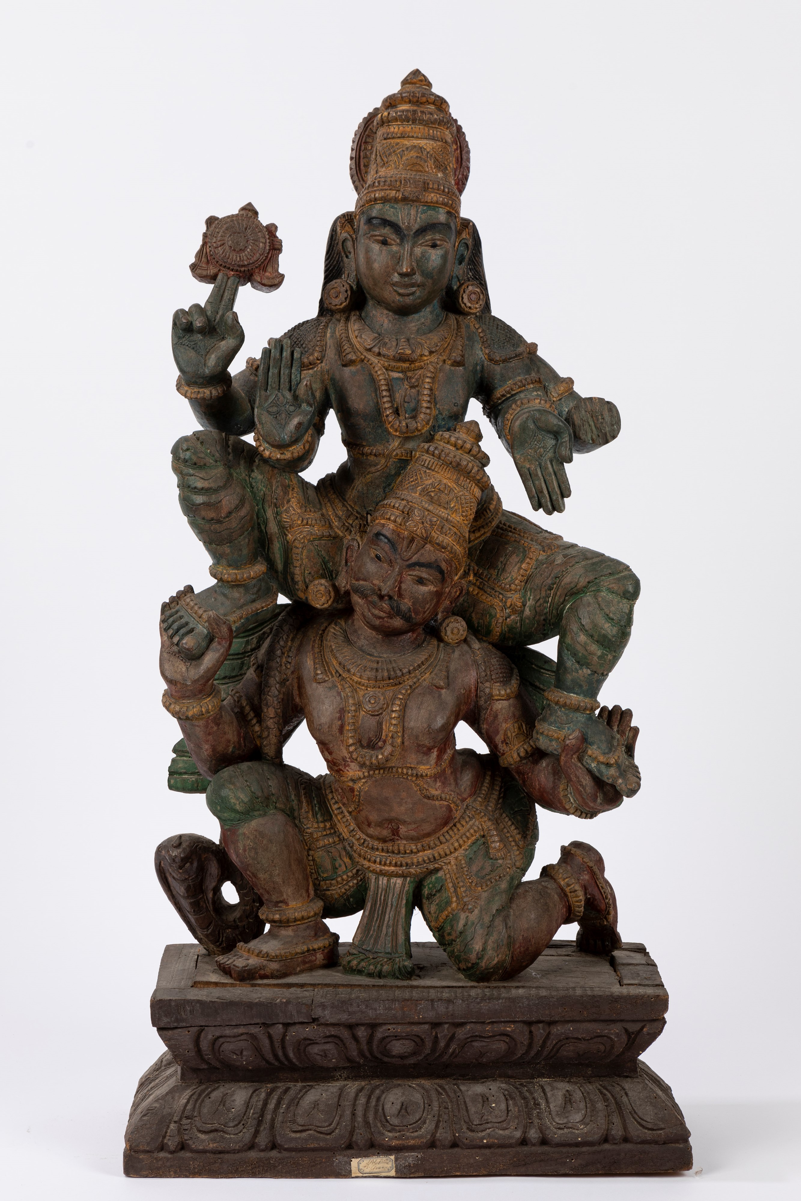 A polycrome wooden sculpture depicting Parvati and Shiva. 20th century 