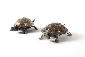 Two turtle-shaped metal bells, 20th century