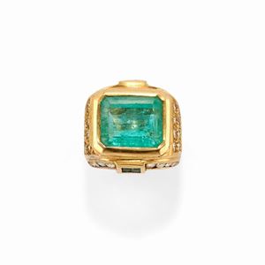 A 18k yellow gold, emerald and diamond ring, with copy of certificate