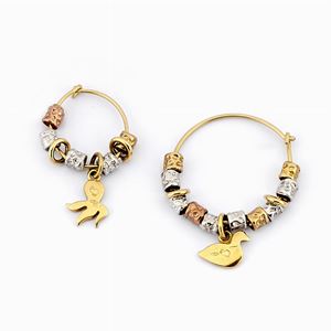 A 18K yellow gold and silver earrings, Dodo Pomellato