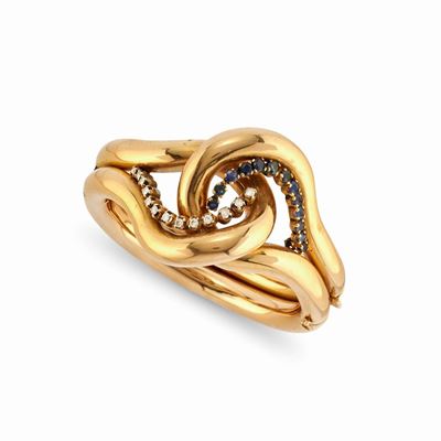 Bracciale rigido a nodo in oro giallo 18k con zaffiri e diamanti