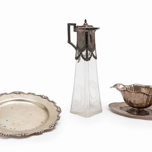 A silver and metal, plate, gravy boat and jug, Italy 20th Century