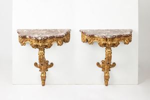 A pair of carved and gilt-wood wall consoles. France 18th/19th  c.