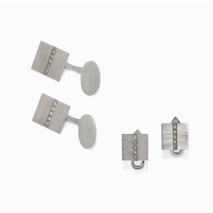 A 18K white gold and diamond cufflinks