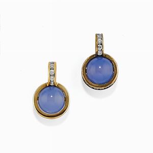 A couple of 18K gold, chalcedony and diamond pendants
