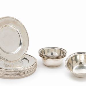 Twelve silver plates and six silver bowls, Italy 20th Century