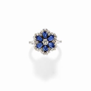 A 18k white gold, sapphire and diamond ring