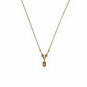A 18k yellow gold and synthetic colorless stone necklace