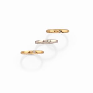 Three 18k two-color gold and diamond rings, Pomellato, "Lucciole" collection